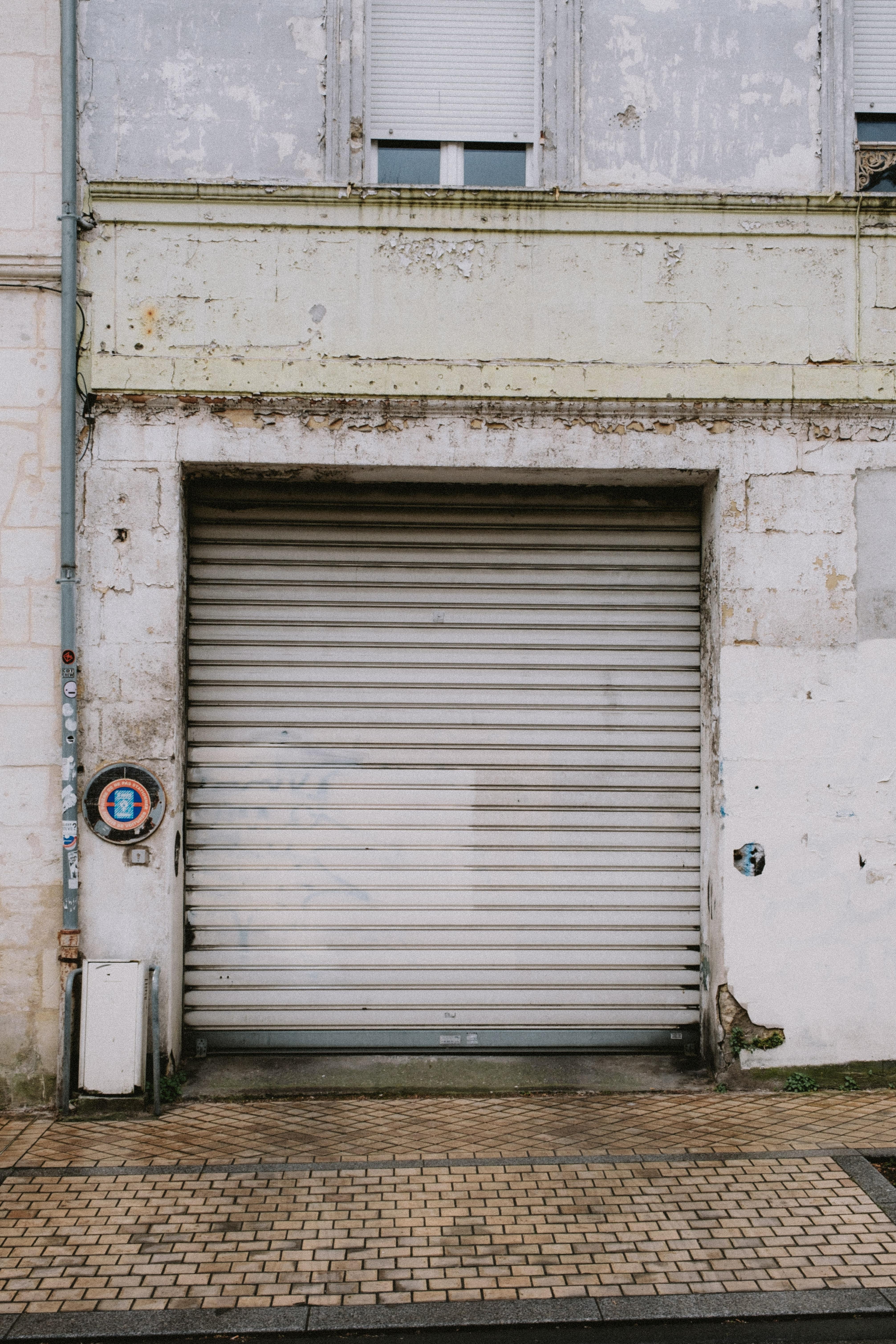 garage door bent at bottom