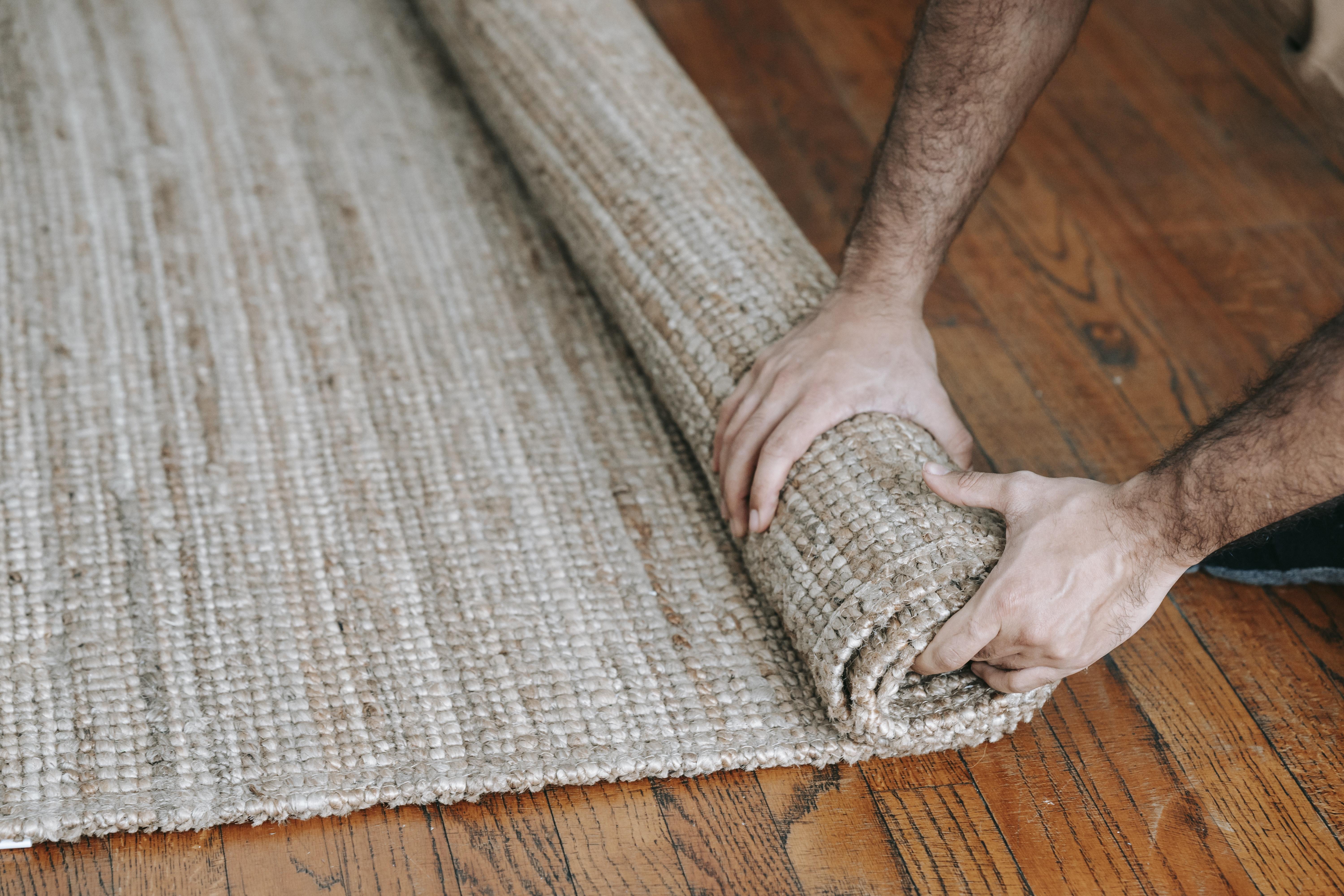 can you put carpet over laminate flooring