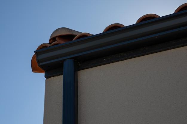 water dripping from pipe in soffit