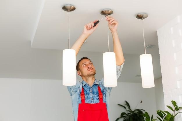 do electricians install light fixtures