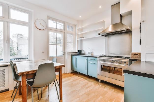 kitchen hood between windows