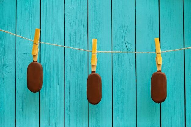 opening a overhead garage door with a coat hanger