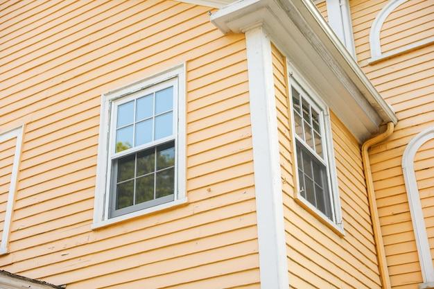 vinyl siding over brick