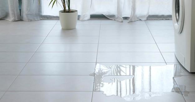 water seeping through kitchen floor