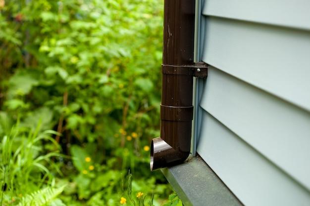 water spigot leaking behind siding