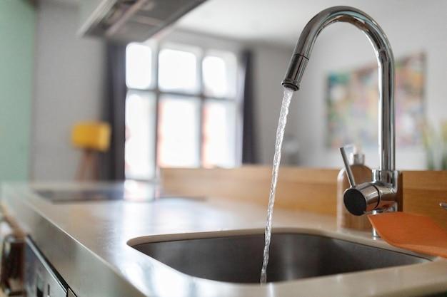 water coming up through kitchen floor