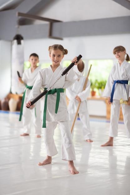 Which Form Of Martial Arts Uses Nunchucks 